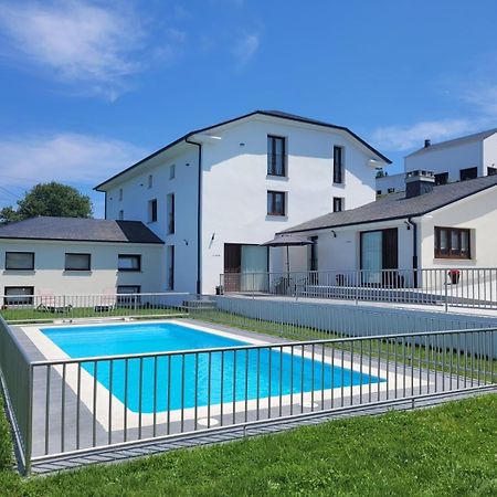 Apartamentos Casona Del Campo Навия Екстериор снимка