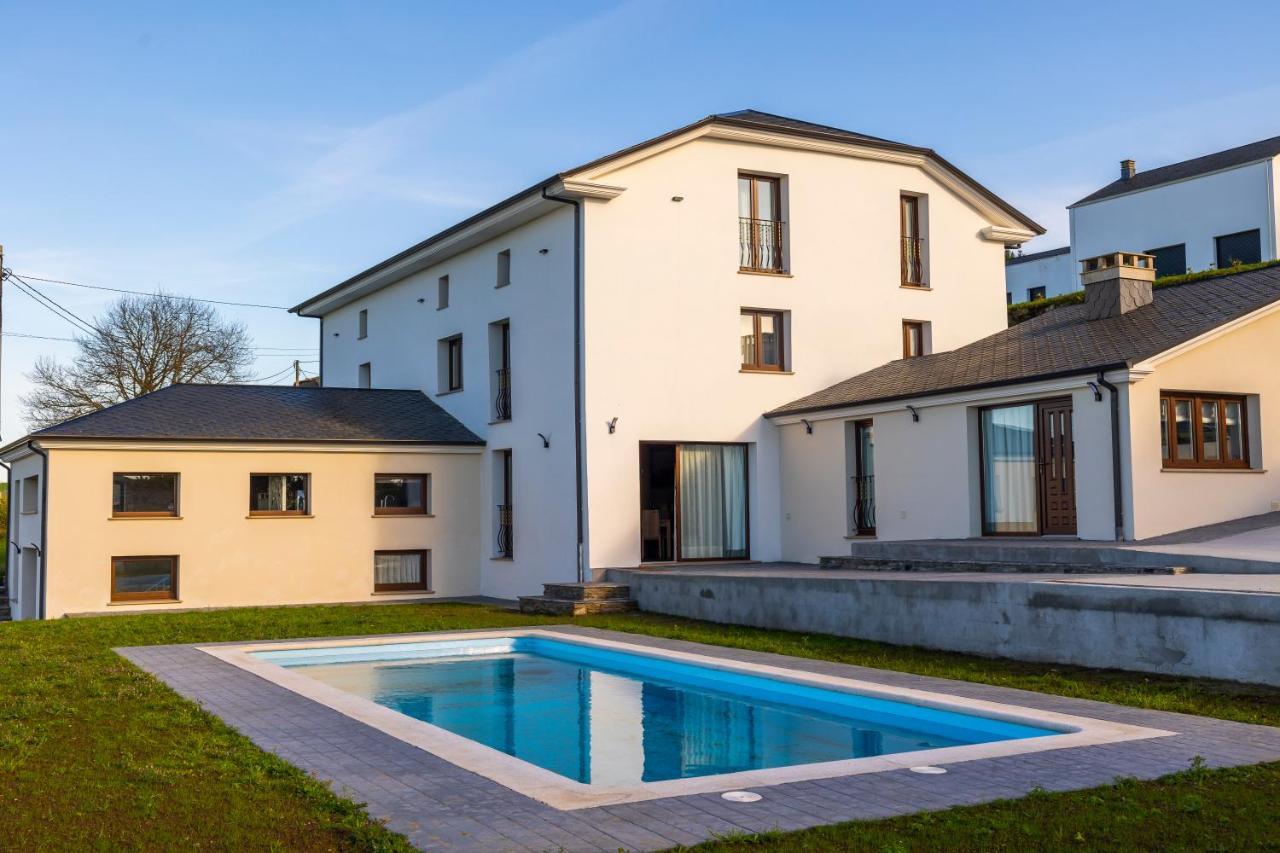 Apartamentos Casona Del Campo Навия Екстериор снимка